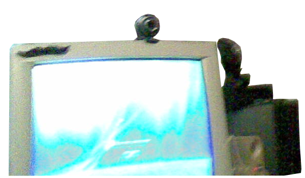 a poor quality, badly cropped photo of the PC setup
