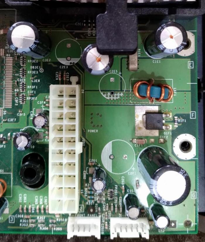 (power caps from top down, illustrating where they sit in relation to the processor heatsinks and board power connector)